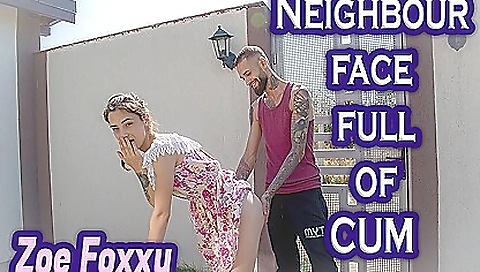 Tattooed babe helps neighbor with a face full of cum