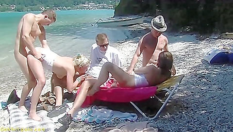 Sexy blonde girl is getting her pussy fucked on the beach