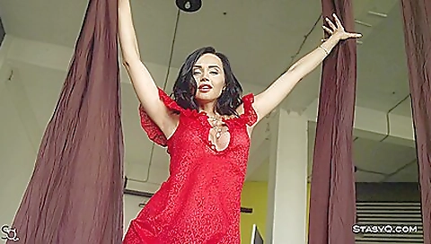 Sexy milf in a white dress stretching her nice body