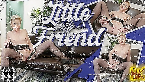 Granny masturbates and toys with a lady and a dildo