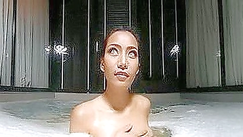 Asian girl with a shaved pussy gets nude in the shower