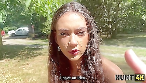 Big cock is penetrating a small tit brunette in the backyard