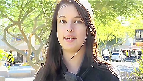 A brunette with a hot body is peeping at a dude on the side