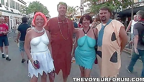 A couple of blondes and a brunette are having a threesome outdoors