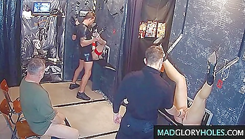 Blonde and black women in stockings party with a group